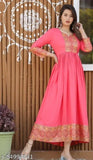 Pink embroidered kameez with long sleeves, fitted waist, and straight cut