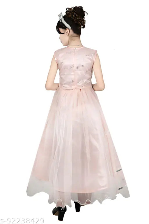 Pink party dress with sleeves and a ruffled hem, fitted bodice