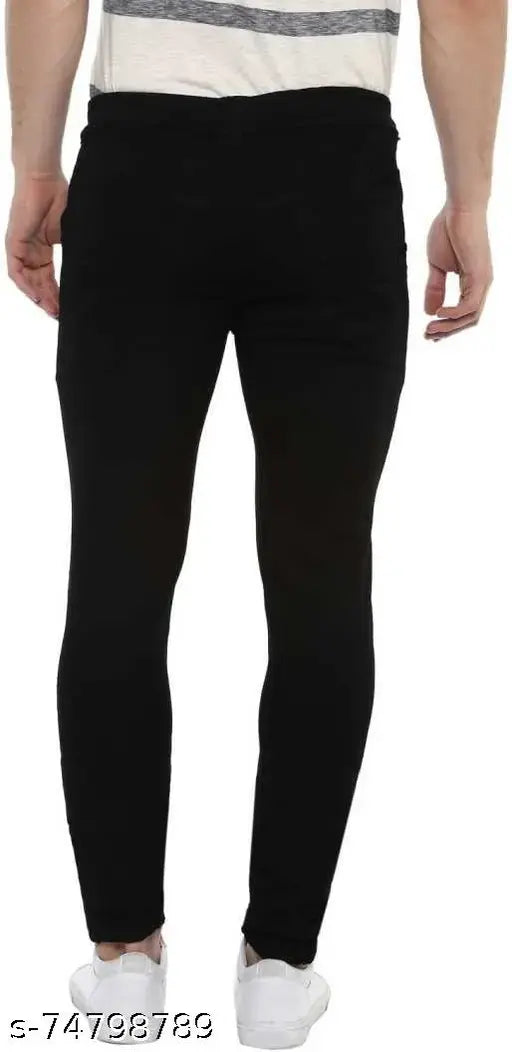 Trendy black denim jeans for men, stretchable slim fit with 5 pockets and a length of 39 inches. Made from high quality Lycra denim fabric. Color may vary due to photography lighting. Size: 28" waist x 40" length. Country of origin: India