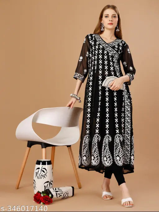 Black embroidered kameez with long sleeves and matching flared trousers