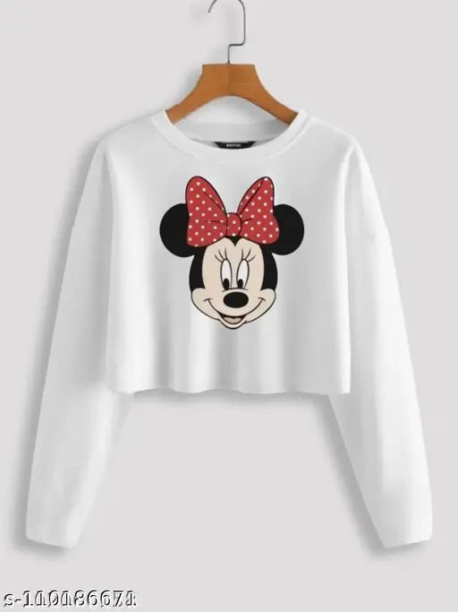 Classic feminine cotton-blend crop tops with long sleeves, printed pattern, sizes S-XL. Women's fashion crop tees on hanger