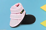 Pink polka dot baby shoes with white soles, casual style
