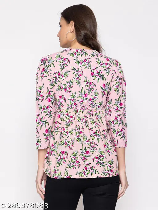 Printed cotton blend three-quarter sleeve top for women, vibrant design on soft fabric, fashionable summer wear from India