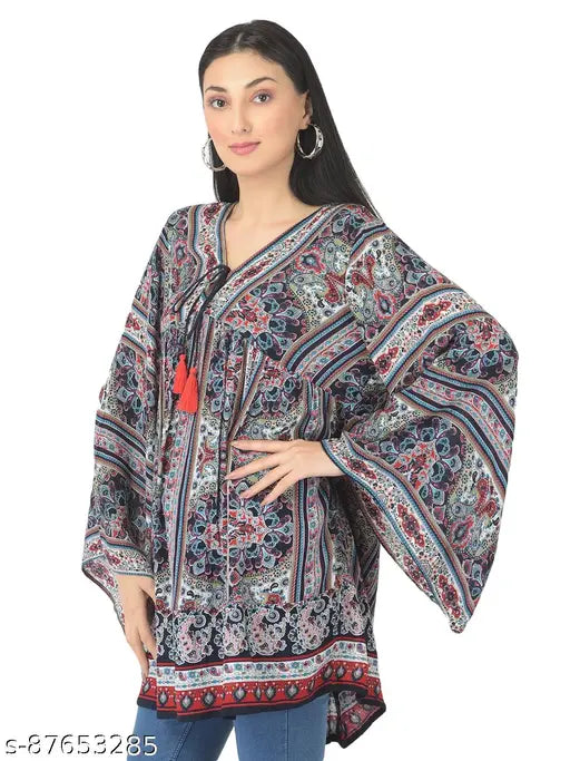 Veldress blue rayon v-neck top with long sleeves and printed pattern