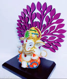 Stone-decorated poly resin Lord Ganesha sculpture, handcrafted from India