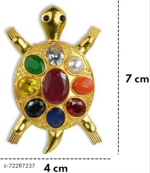 High-quality brass, gold-polished Navratna Turtle statue with semi-precious gemstones for Feng Shui and good luck office decor. Includes Ruby, Pearl, Red Coral, Emerald, Yellow Sapphire, Diamond, Blue Sapphire, Hessonite, Cat's Eye. Handmade, store carefully; avoid perfume/water contact. Ideal placement: back of house or entrance for protection, east sector for dedication, north sector for career boost. Made in India