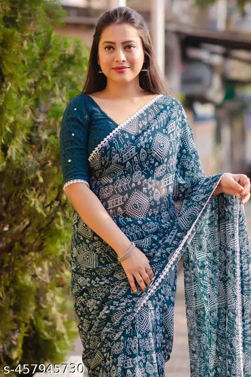 Fashionable navy blue saree with white warli print design and lace border