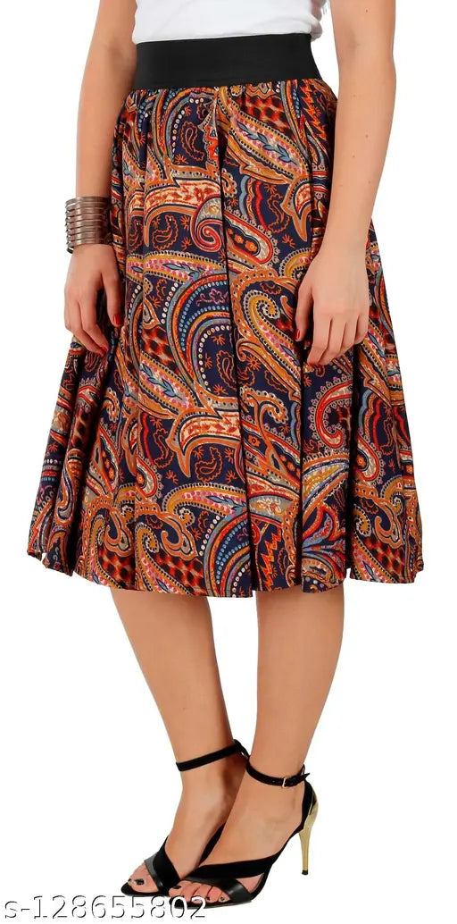 A woman in a brown paisley mid-calf length skirt paired with a matching top, showing a casual yet stylish look