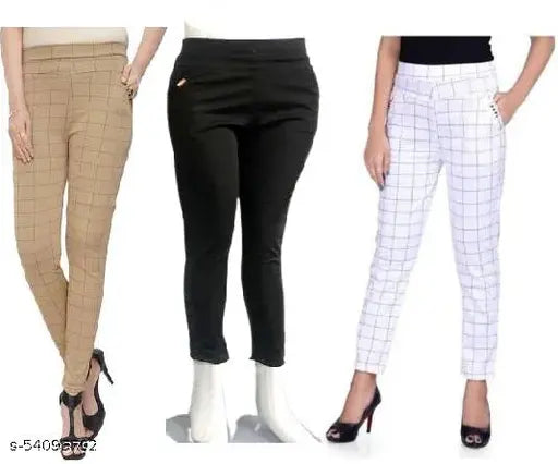Printed net Lycra blend 4M-check trousers for women, ankle length in Black/White combo with embellished pockets and elastic waist. Suitable for casual, party, office wear