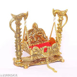 Metal Krishna idol Jhula showpiece, gold-tone decorative for home or office - 16.5 cm long