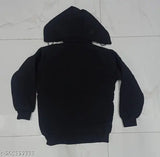 The image shows a black jacket with hood, displayed flat on a surface