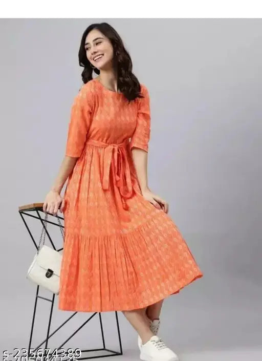 Orange casual women's dress, anarkali design, printed in a floral pattern with calf-length cuffs and skirt, cotton blend fabric