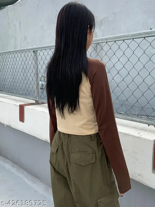 Cotton women's crop raglan t-shirt with long sleeves, printed net design. XS (34in bust, 16in length), S (36in bust, 17in length), M (38in bust, 17in length), L (40in bust, 18in length), XL (42in bust, 18in length), XXL (44in bust, 19in length). Made in India