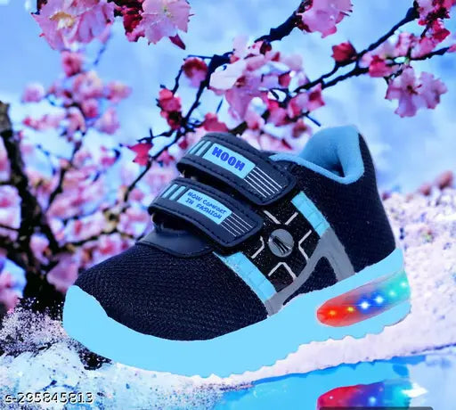 Blue and black kids' shoes with lights, featuring a strap across the top, designed for walking