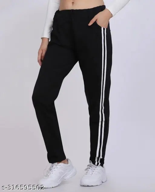 Black athletic track pants with white stripes and pockets