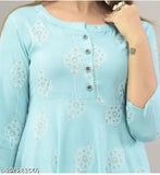 Sky blue printed cotton kurti, three-quarter sleeves, vibrant floral pattern. Single size: XS (bust size: 34 in). Made in India