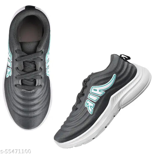 Black and white sports shoes with 'air' logo, designed for boys