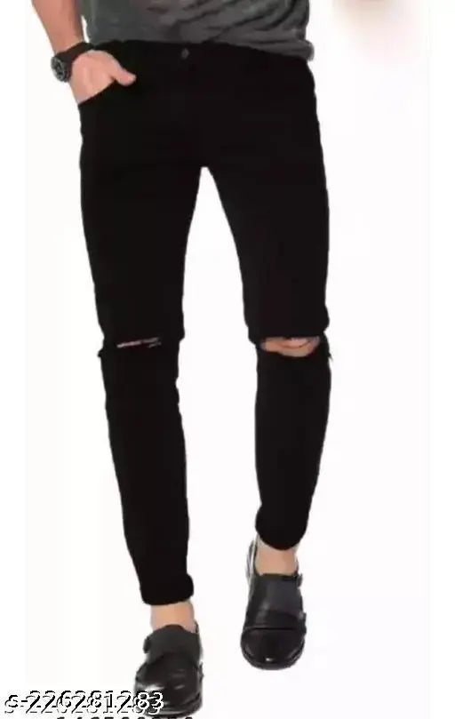 Black polycotton solid net agate jeans for casual and parties, trusted brand - BLACK FIT on display rack. Available in sizes 28, 30, and 32