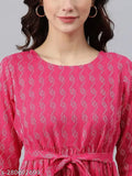 Pink cotton Shambhavi Creations Janifer Kurti with woven design, three-quarter sleeves. Women's traditional Indian attire for casual or semi-formal wear. Available in sizes XS, S, M, L, XL, XXL. Made in India