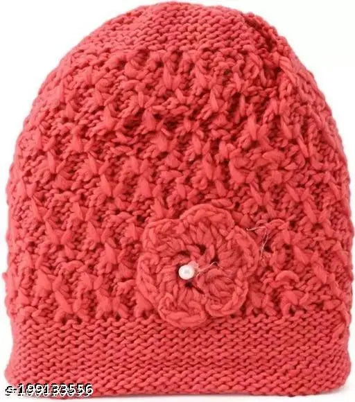 Red wool beanie with flower design and a tag, unisex cap