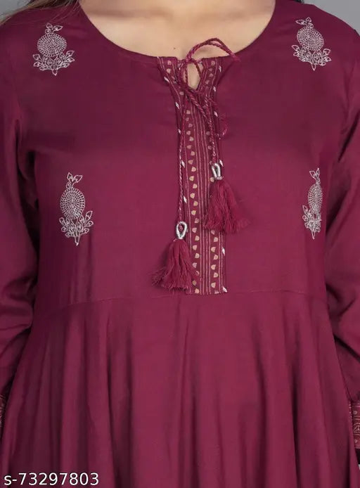 Rayon printed combo Alisha Ensemble kurtis with three-quarter sleeves, vibrant Indian fashion on model