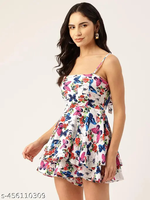 White and blue printed layered playsuit, sleeveless with pockets, polyester material. XS (32-26-36in), sustainable fashion