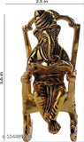 Brass Ganesha figurine, Lord Ganesha sitting on chair reading Ramayan, ornate Indian decorative showpiece