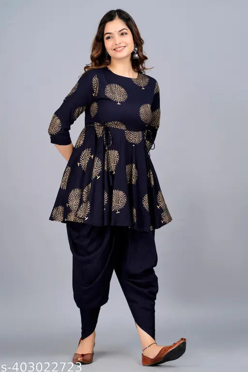 Rayon Women's Printed Dhoti Kurta Set with 3/4th sleeves, Maroon color, Anarkali design, and Dori embellishments. Indian handcrafted fashionable kurta & dhoti pant set for women