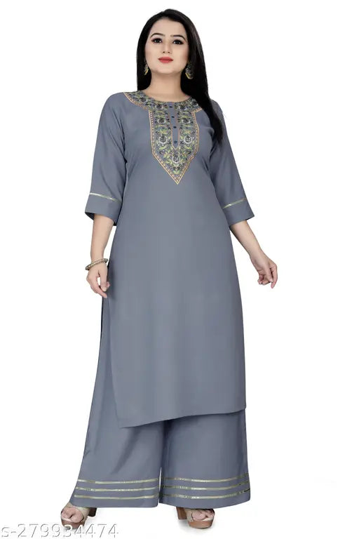 Grey poly blend embroidered kurti & palazzo set for women, solid net pattern, three-quarter sleeves, Palazzo style, by NirFashion. Superior quality Indian ethnic wear with sequence and gotta patti lace detailing