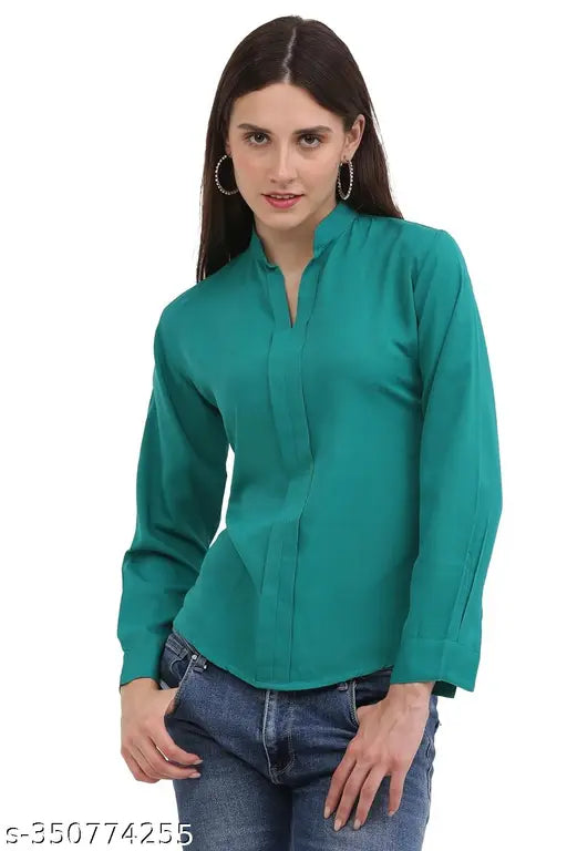 Jade green poly crepe formal top with notched neckline and full cuff sleeves for women