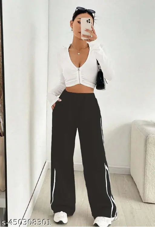 Black high-waisted bellbottom trousers for women