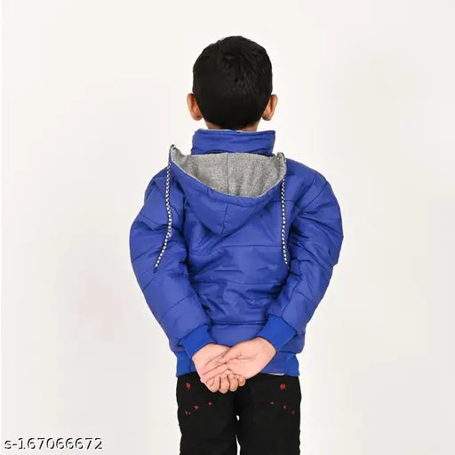 Baby in blue jacket with hood and pockets, styled with red piping