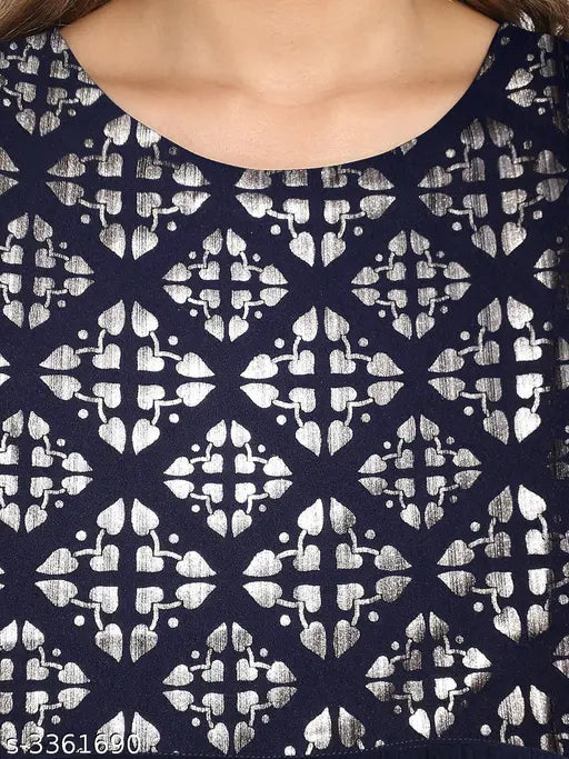 Navy and black patterned blouse with cold-shoulder design