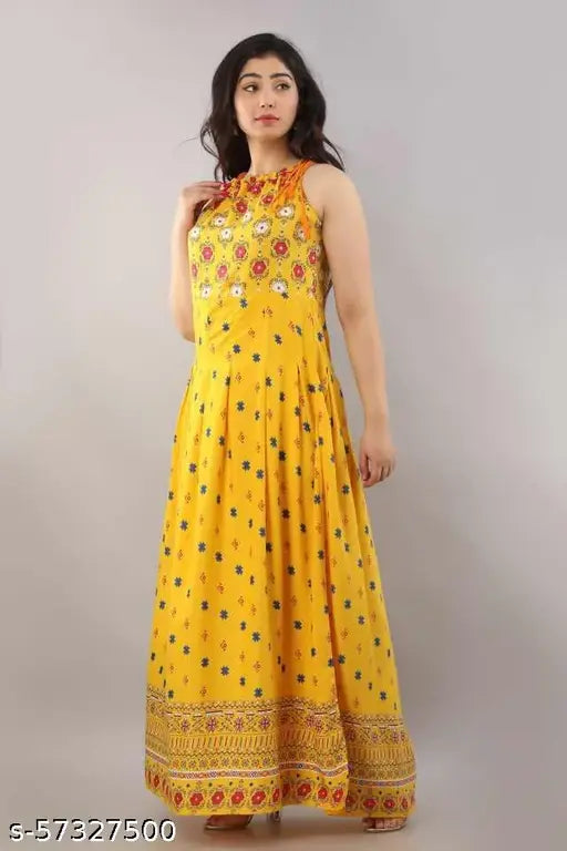 Mustard yellow printed long rayon kurti, sleeveless with intricate Indian design, great for casual wear or festive occasions