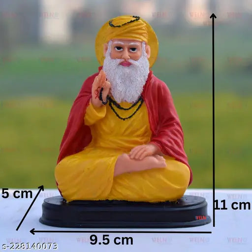 Delicate, colorful Guru Nanak Ji idol from India, beautifully crafted with beads and a serene expression