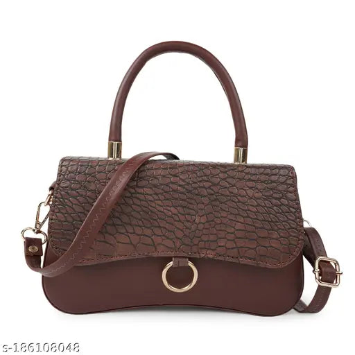 Textured synthetic handbag, features a main compartment, coin pocket, and mobile compartment. Suitable for all occasions with three handles – one hand handle, one shoulder handle, and an adjustable side handle. Handbag/sling bag for women or girls, originating from India