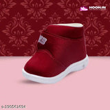 Red velvet kids' shoes with black laces