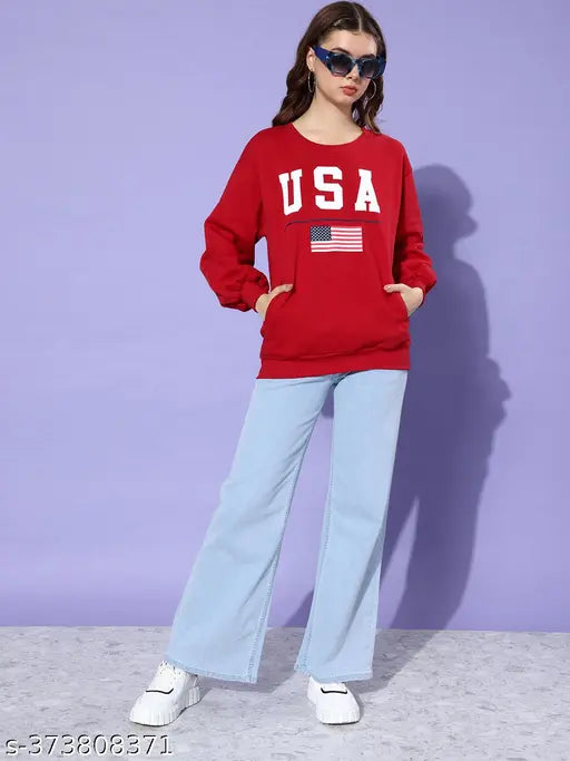 Women's red oversized cotton sweatshirt with long sleeves and printed net pattern. Size: XS (39in bust, 26in length, 39in waist, 19in shoulder), S (41in bust, 27in length, 41in waist, 20in shoulder), M (43in bust, 27in length, 43in waist, 20in shoulder), L (44in bust, 28in length, 44in waist, 21in shoulder). Great for stylish comfort. Made in India