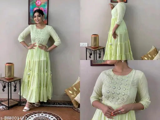 Light green rayon embroidered flared anarkali gown with mirror work and beautiful tessles, single sizes S-7XL