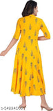 Yellow women's printed rayon Aline kurti with three-quarter sleeves, suitable for jeans or leggings. Indian-made fashion statement
