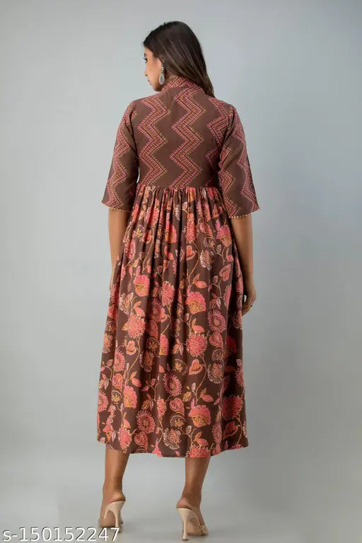 Brown rayon printed Anarkali Kurta with floral pattern, calf length and V-neck style for women's casual, party, or travel wear. Size chart: XS (32/28), S (34/30), M (36/32), L (38/34), XL (40/36), XXL (42/38). Authentic Indian product