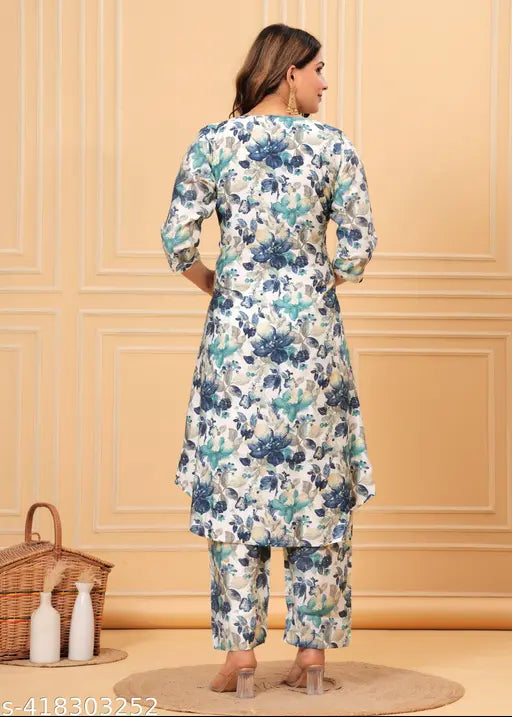 Women's floral printed muslin fabric kurta with trousers, kora muslin and regular beads/stones, three-quarter sleeves set on display