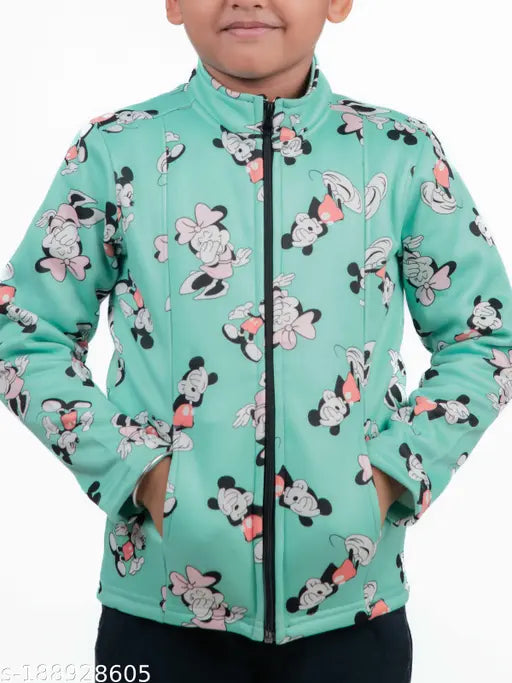 A child in a Minnie Mouse winter jacket, black with white dots and zip closure
