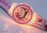Black plastic Hello Kitty DJ watch with glowing eyes and red heart accent