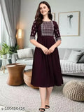 Black, lace-trimmed knee-length dress with short sleeves