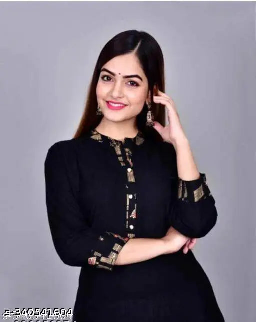Woman wearing black embroidered kurta with matching bottoms