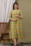 Yellow cotton maternity kurti gown with ikat print, adjustable back robe, discreet feeding access. Indian-made maternity dress for pre and post pregnancy wear." (125 characters)