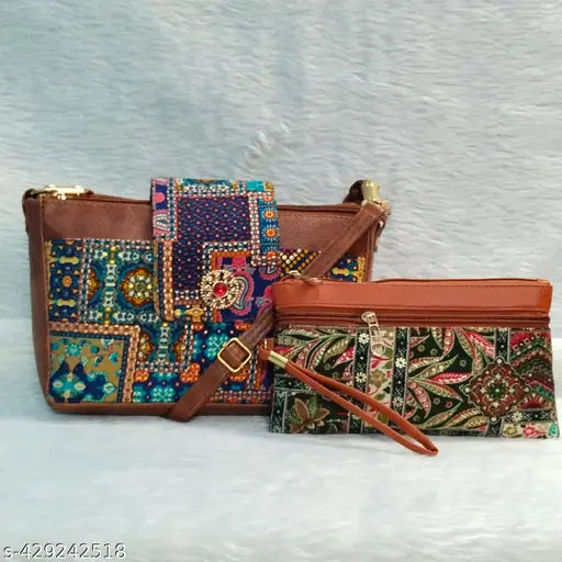 A stylish combo sling bag for women, featuring vibrant embroidered patterns and a zip closure