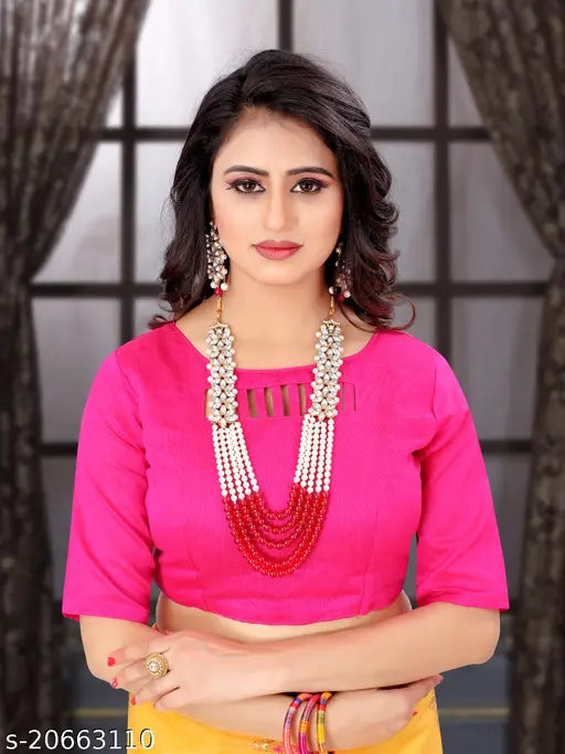 Pink silicon net embroidered designer saree with unstitched silk blend blouse piece, Indian fashion accessory on display