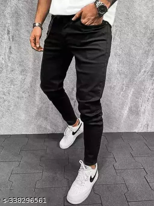 Men's black cotton blend jeans, solid pattern. Stylish black denim for men with waist sizes 26, 28, 30, and 32. Made in India